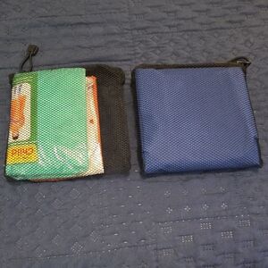NIP ADULT and KIDS PONCHOS IN MESH CARRY CASES